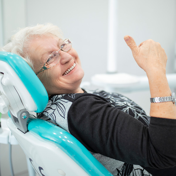 lady smiling in dental chair